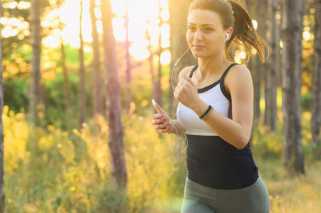 Person exercising outdoors while staying motivated on their fitness journey.