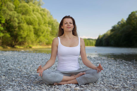 Healthy morning routine with a glass of water, yoga mat, and nutritious breakfast.